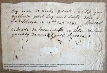 Worn, creased paper with cursive French handwriting and ink smears; bottom caption notes it’s a receipt found during redevelopment near grain elevators.